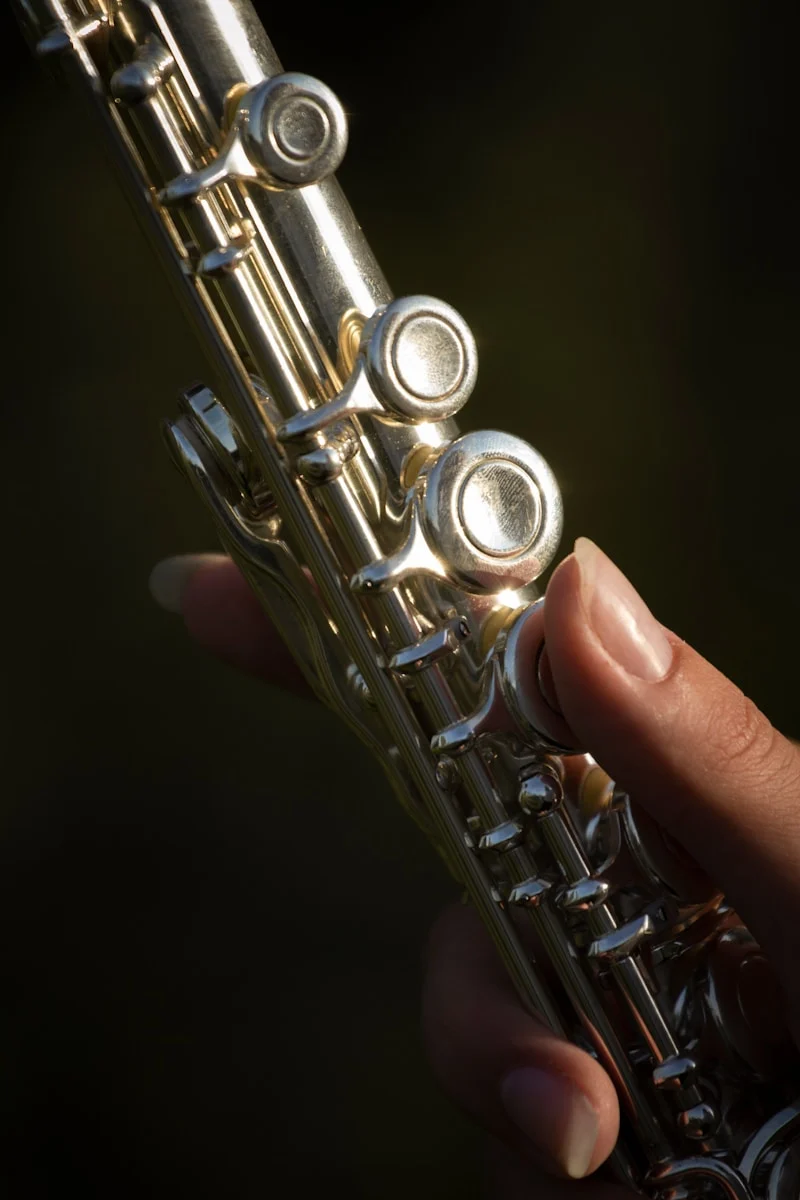 a hand holding a metal object